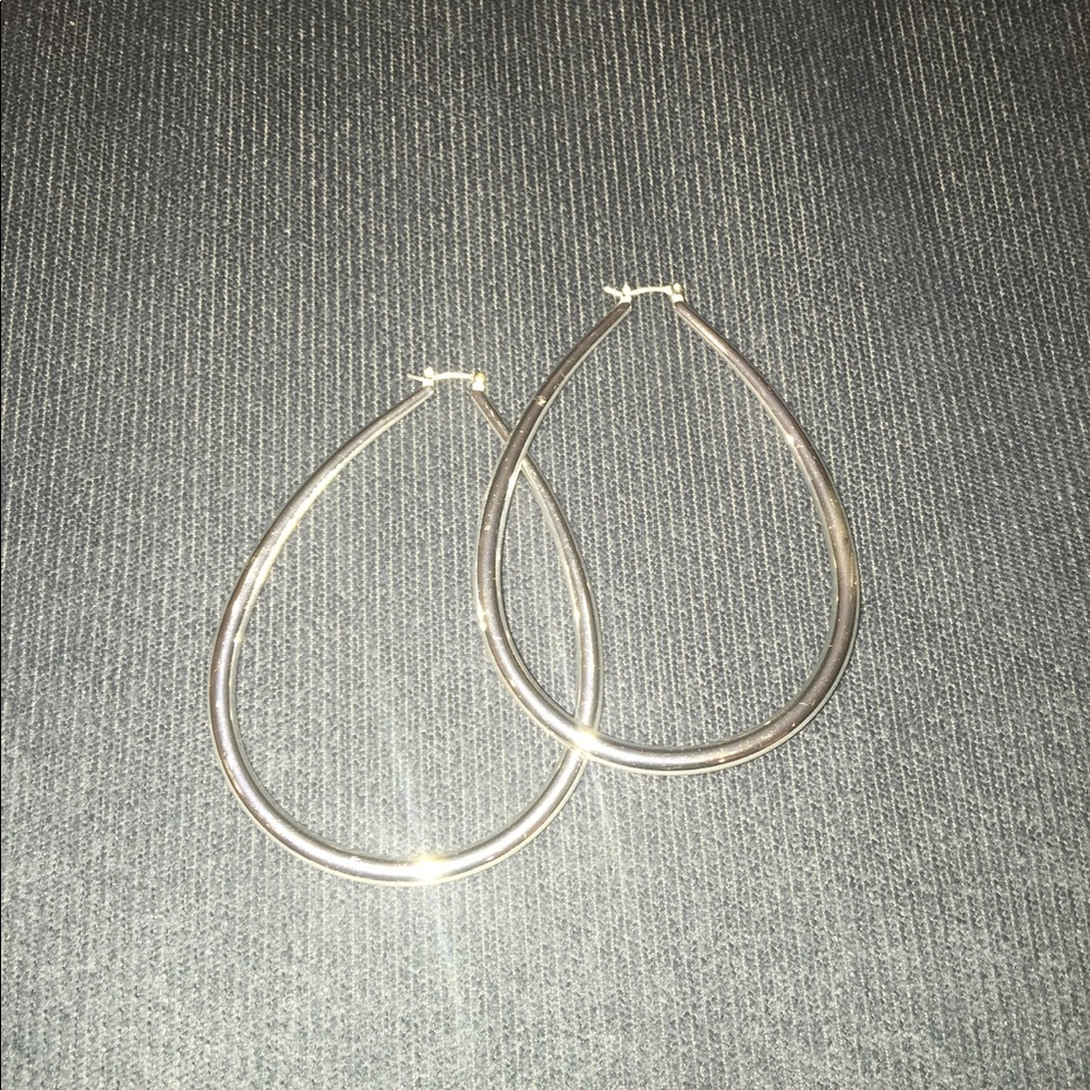 Large tear drop shaped silver earrings